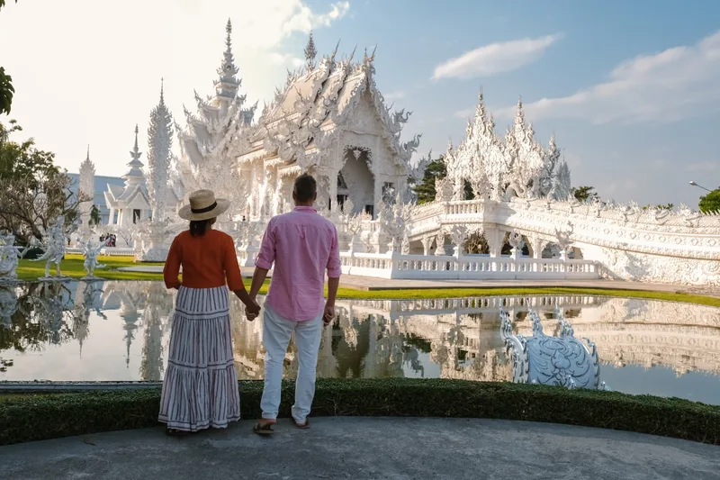 Visitors before the White Temple, Wat Rong Khun, in Chiang Rai